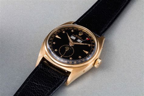 rolex lancette arancioni|rolex 6062 black star.